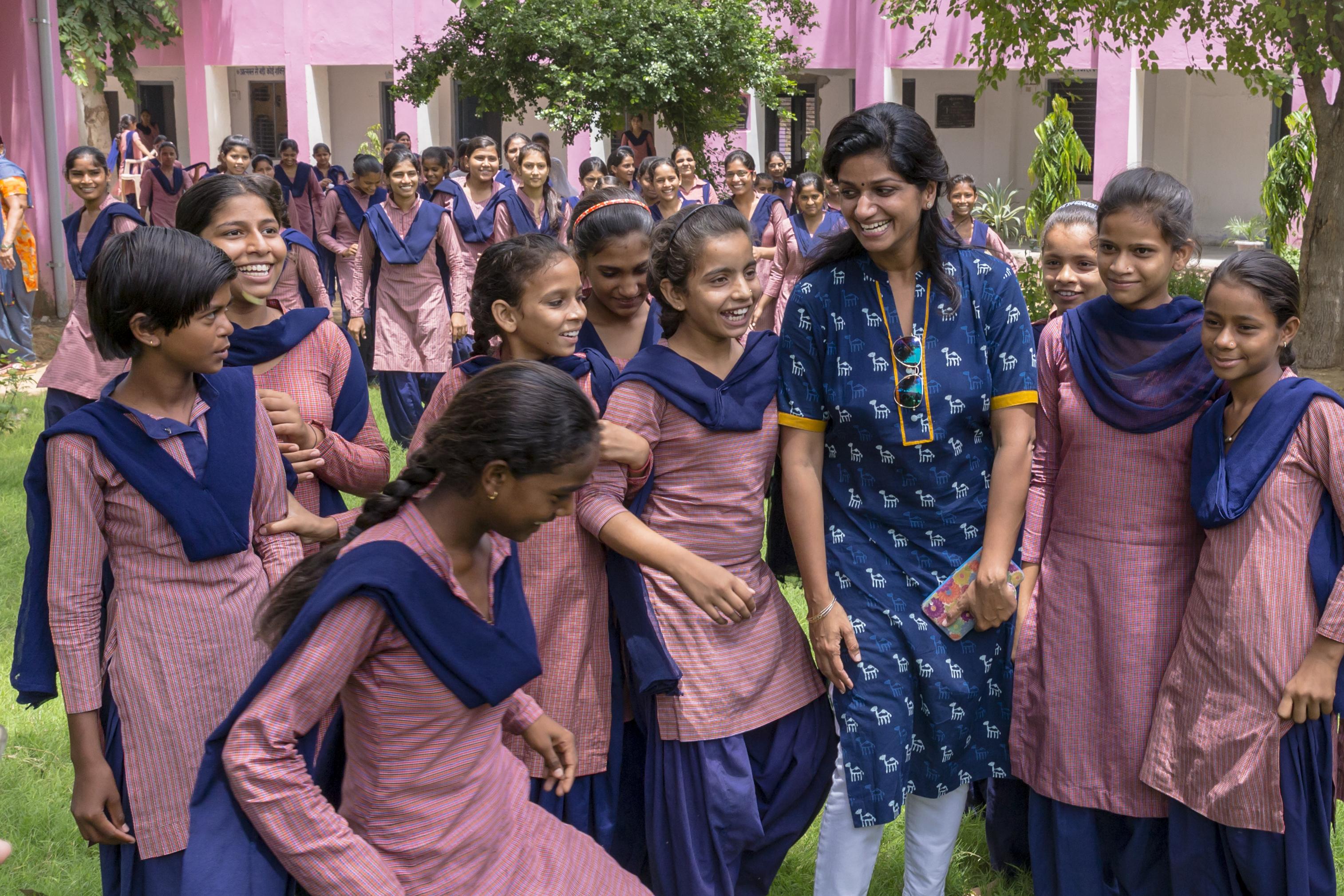 Gita Yadav, third from right, telling stories of scientists to secondary school girls at Govt Girls School, village Dahina, Mahendragarh district, India. None